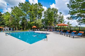 Two resort-style pools with expansive sun deck